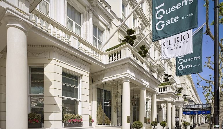100_qg_exterior_with_flags_curio_162533-768x0